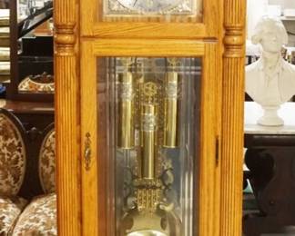 1162	HOWARD MILLER GRANDFATHERS CLOCK, MILLENNIUM EDITION IN SOLID OAK CASE W/BEVELED & ETCHED GLASS, APPROXIMATELY 27 IN X 17 IN X 88 IN HIGH
