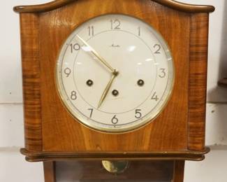 1161	GERMAN ART DECO MAUTHE WALL CLOCK W/CURVED GLASS BOTTOM, APPROXIMATELY 13 IN X 5 IN X 15 IN HIGH
