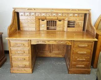1178	CONTEMPORARY SOLID OAK ROLL TOP DESK, OAK CREST MANUFACTURING W/PANELED SIDES & MULTI DRAWER INTERIOR, TAMBOR STUCK, APPROXIMATELY 66 IN X 36 IN X 51 IN HIGH
