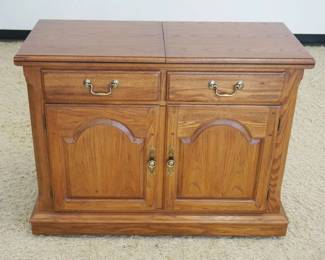 1182	SOLID OAK THOMASVILLE FLIP TOP SERVER, 2 DOOR, 2 DRAWER, APPROXIMATELY 42 IN X 18 IN X 33 IN HIGH
