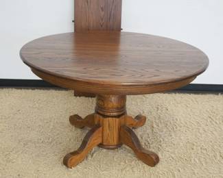 1183	SOLID OAK 48 IN ROUND PEDESTAL TABLE W/18 IN LEAF
