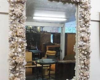 1184	ORNATE CONTEMPORARY SEASHELL MIRROR, SOME LOSS TO FRAME, APPROXIMATELY 32 IN X 41 IN
