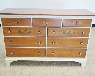 1215	CONTEMPORARY LAMBERT HITCHCOCK CHEST, STENCILED & PAINT DECORATED, 9 DRAWER, SOME WEAR TO SURFACE TOP, APPROXIMATELY 55 IN X 19 IN X 36 IN
