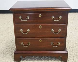 1235	LINK-TAYLOR HEIRLOOM SOLID MAHOGANY MINIATURE CHEST ON BRACKET FEET, APPROXIMATELY 24 IN X 16 IN X 25 IN
