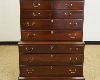 1237	LINK-TAYLOR HEIRLOOM SOLID MAHOGANY HIGH CHEST, 9 DRAWER ON BRACKET FEET, APPROXIMATELY 40 IN X 20 IN X 56 IN HIGH, SUN FADE TO FINISH ON SIDES
