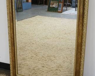 1267	HANGING BEVELED EDGE MIRROR IN GILT FRAME, APPROXIMATELY 30 IN X 42 IN
