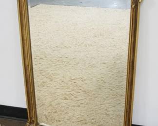 1269	HANGING BEVELED EDGE MIRROR IN GILT FINISHED FRAME, APPROXIMATELY 25 IN X 38 IN
