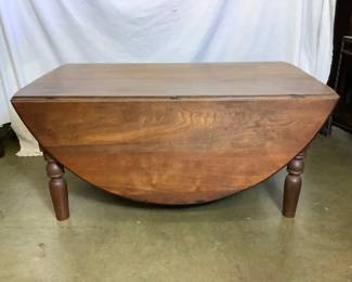 JIFI208 Antique Coffee Table Has two sides that do fold down for maybe using in smaller areas. Does have some wear, is kinda heavy, hand made with very solid wood.
