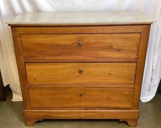 JIFI210 Antique Biedermeier Marble Top Dresser Has extra large, 3 dovetail craftsmanship. No hardware or knobs to pull drawers open. When made a drawer was probably pushed & pressure would cause drawer to "bounce" open, enough to pull drawer out. Bottom keyhole is missing metal ring. probably made from maple. Estimated to be around 200 years old.