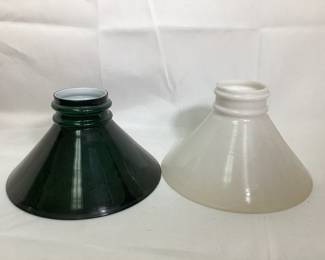 JIFI705 Cased Glass Lamp Shades Two glass lamp shades: one is white the other dark green.