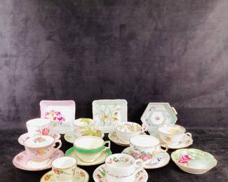 JIFI710 Antigua Vintage Tea Cups And Signed Limoges Lot includes 9 tea cups with saucers, 2 signed Limoges and 3 trays. One of the tea cups is a Milton's Demitasse.