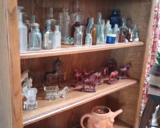 Horse collectables, pottery, Indian relics and antique bottles 