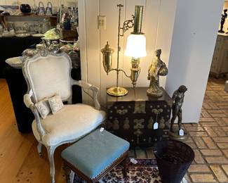 Reupholstered French-style armchair, student desk lamp with glass shade, Brass Trimmed Chest with Drop-front Opening to interior storage