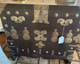 Brass Trimmed Chest with Drop-front Opening to interior storage