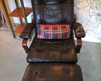 Comfortable leather recliner with ottoman