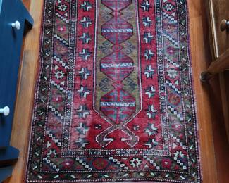 Many Persian and Oriental Wool Carpets in this home! This Carpet is handwoven. 