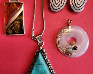 Silver, Turquoise, Gold detail and Precious Stones on these beauties!
The Turquoise and Sterling Necklace is by artist Tom Willette and it is signed. 