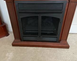 Electric Fireplace also has the gas insert brand new never used
