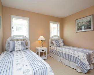 Twin beds - stylish wicker