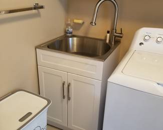 Laundry sink with base cabinet