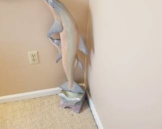 Carved wood dolphin sculpture 
