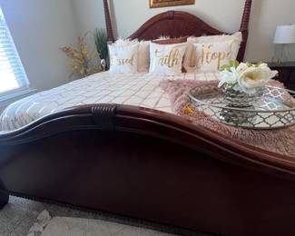 Four poster Mahogany wood bed w/ matching dresser, night stands, and hi-board.