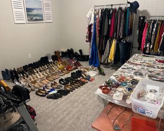 Designer handbags and clothes, jewelry, shoes, boots.