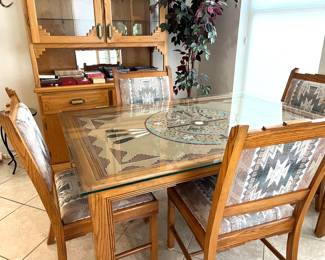 Signed sand painting under glass oak dining table