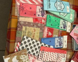 Tons of tissue. Gift tags. Decorative boxes