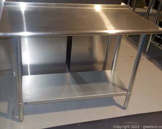 Stainless Steel Work Table with Back Splash and a Lower Shelf