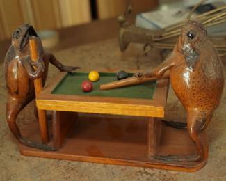 Frogs playing pool