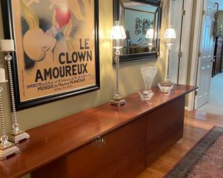 Art Deco Credenza with sliding doors and shelves and drawers inside; French artwork - framed, silver-plated buffet lamps, Candle holders, and Lalique vase  