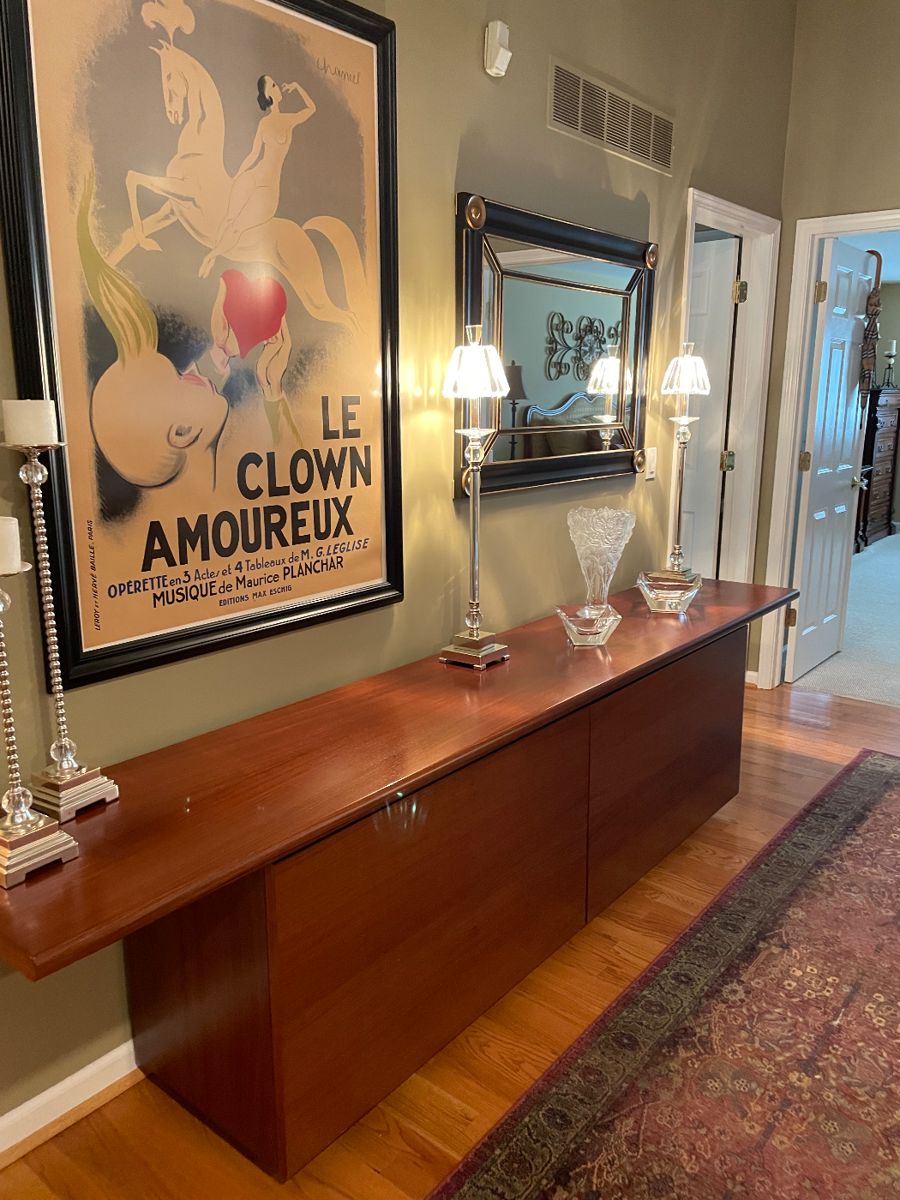 Art Deco Credenza with sliding doors and shelves and drawers inside; French artwork - framed, silver-plated buffet lamps, Candle holders, and Lalique vase  