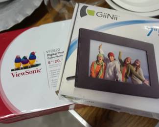 Two digital picture frames still in the box