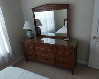 bureau with mirror and lamp