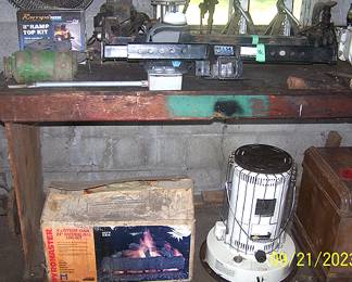 Reese hitches, gas log set, kerosene heater, jacks, and more