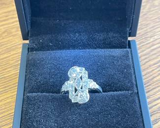 Platinum size 7 shield ring. Single cut diamond equal 1 karat 