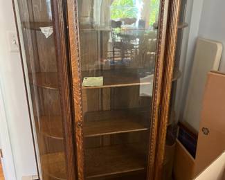 Many Curio cabinets