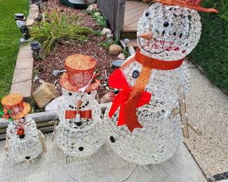outdoor snowman family