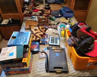 Assorted puzzles, games, hats, etc.