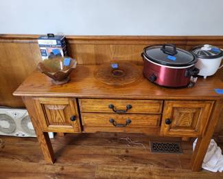 sofa table, glass bowls, small appliances