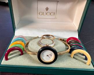 Gucci watch with multi-color bezel rings 