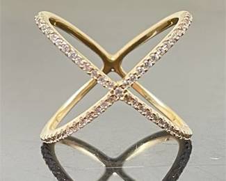 Lot 012  
Sterling Criss Cross Ring, Cubic Zirconia and Gold Vermeil