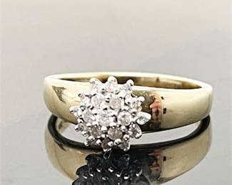 Lot 015  
Diamond and 14K Yellow and White Gold Ring