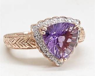 Lot 034  
Trillion Cut 2.8 Carat Amethyst and Diamond 14K Rose Gold Ring