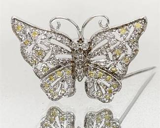 Lot 033  
Sterling and Yellow Topaz Butterfly Brooch