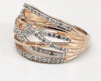 Lot 038  
Diamond and 14 K Pink Gold Entwined Ring Band