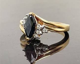 Lot 039  
Blue Sapphire and Diamond 14 K Cocktail Ring