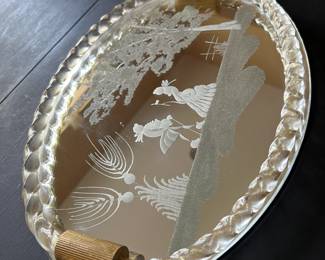 NOT CHEAP! Created by Ercole Barovier.
This piece is a beautiful Italian serving or vanity table tray edged in Murano glass rope with gold inclusions.
Done in the style of Luigi Brusotti and Gio Ponti,
the mirror is etched with Venetian romantic figures
and a scenic country landscape. $500 OBO