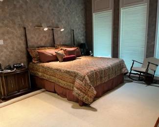King bed with 2 nightstands and dresser with mirrors.